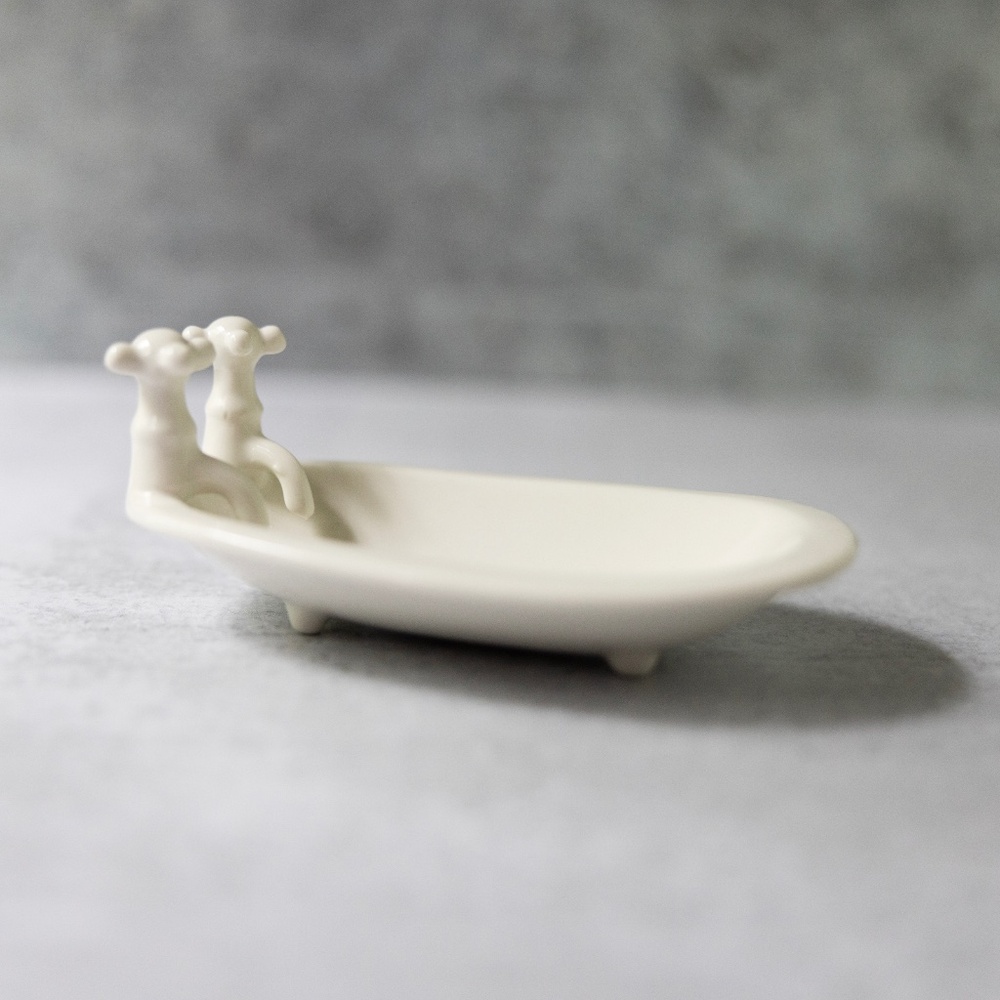 White ceramic soap dish old fashioned bathtub bath tub bathroom decor